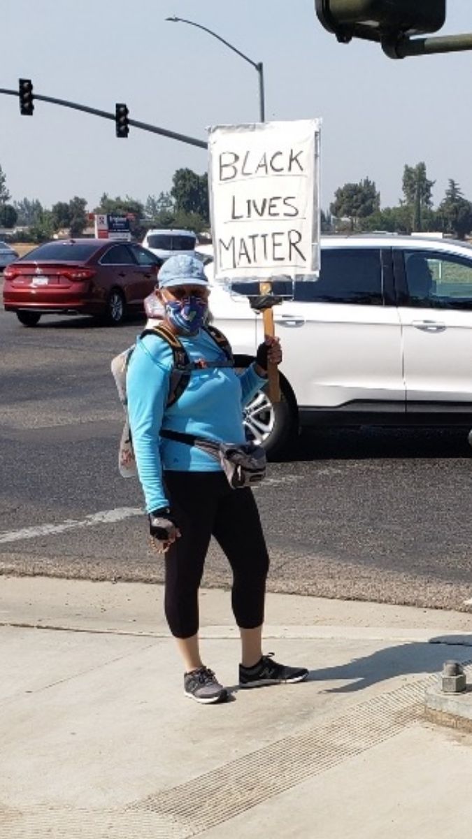 Jovita with Black Lives Matter sign